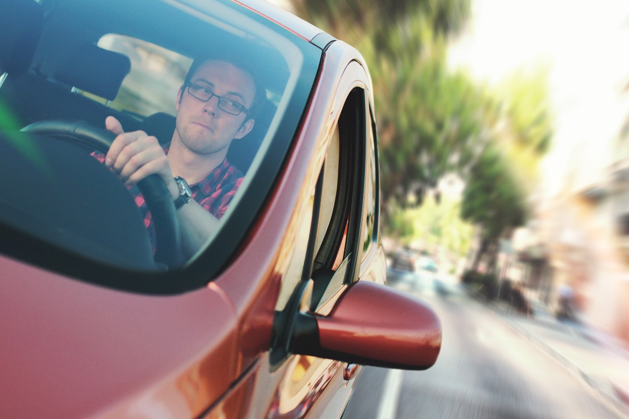 man driving car free