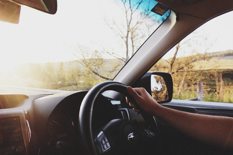 person driving vehicle