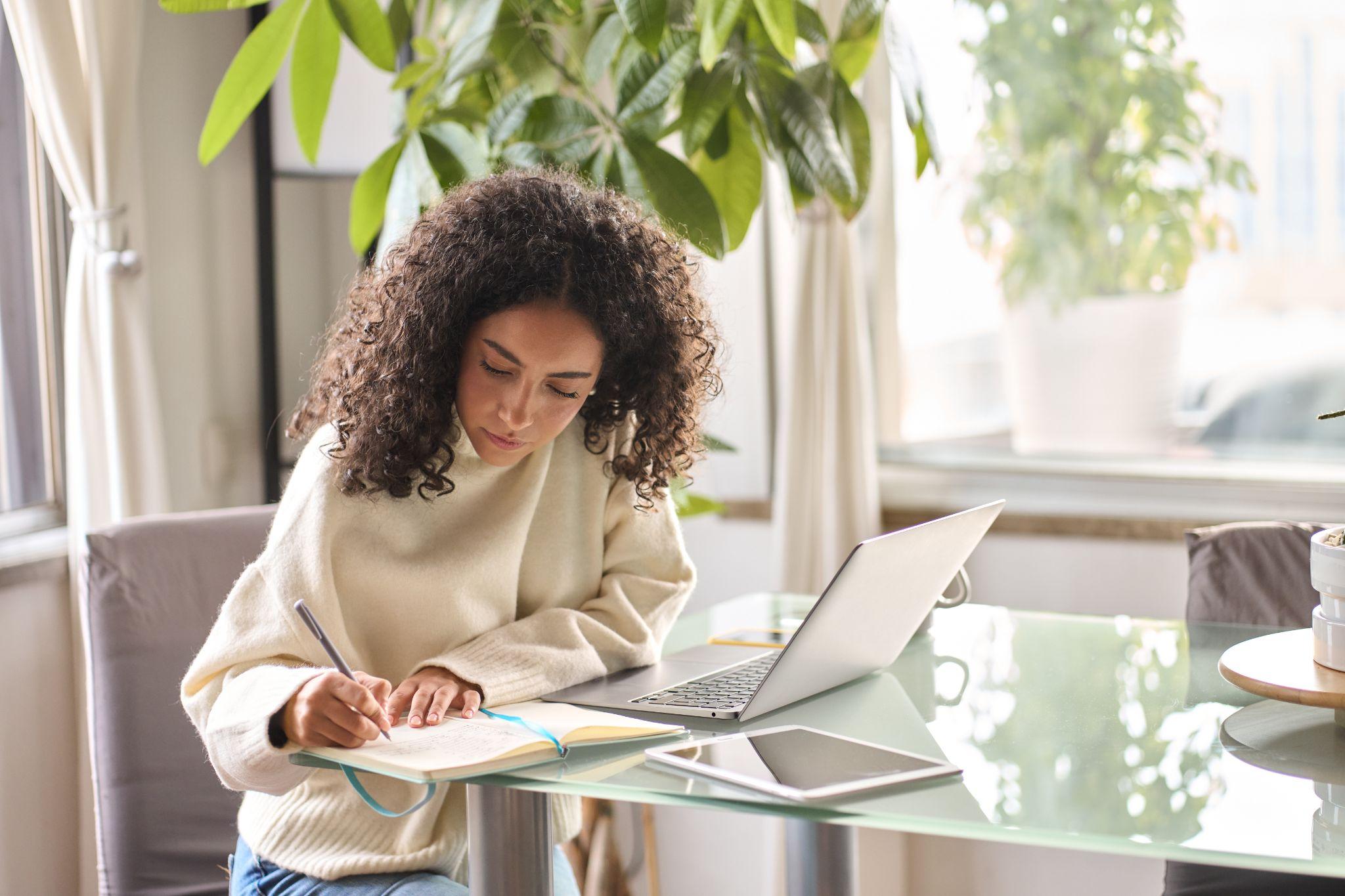 Young girl student using laptop e-learning