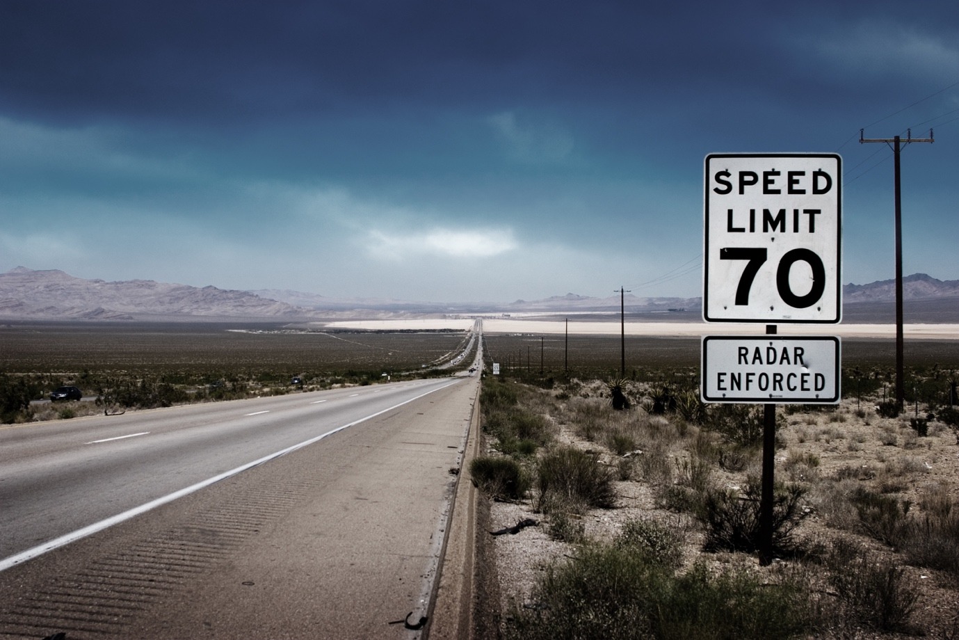 road side banner of speed limit 70