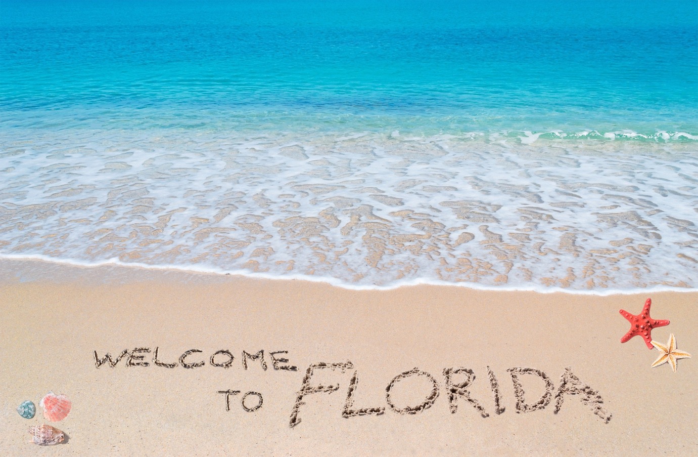welcome to florida written near beach