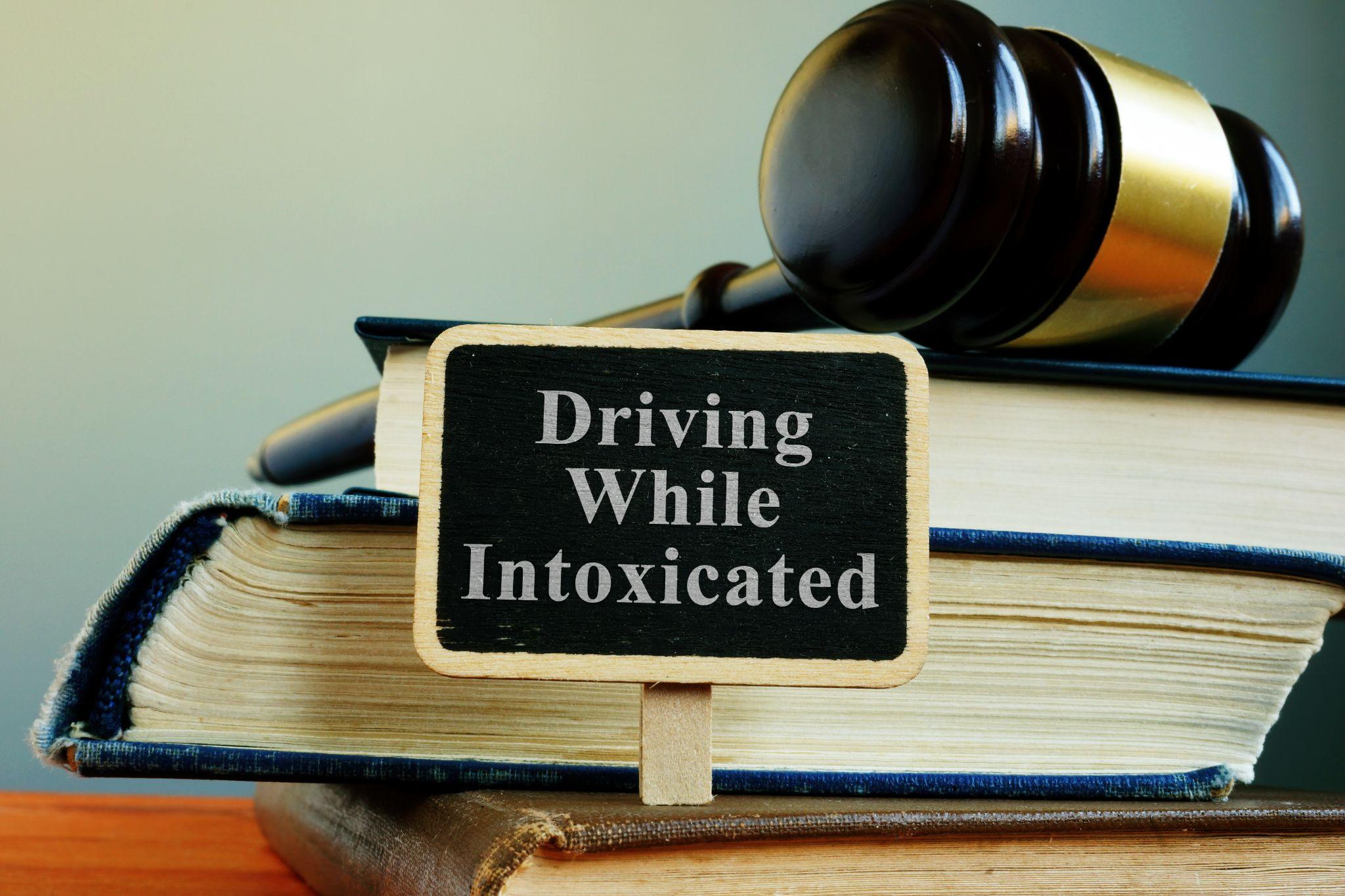 DWI driving while intoxicated law and books.